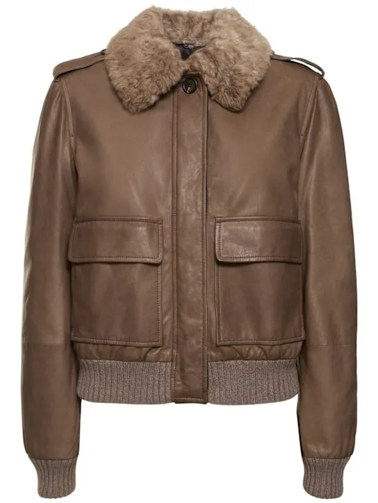 Brunello Cucinelli   Leather jacket w/ furry collar 