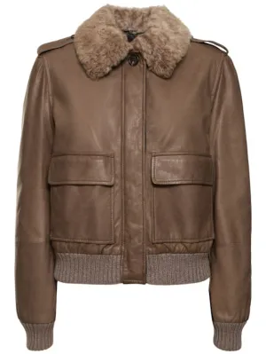 Brunello Cucinelli   Leather jacket w/ furry collar 